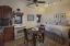 Bedroom with full kitchen